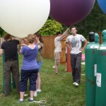 inflating and tying off balloons