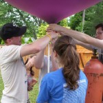 tying a balloon to the rope